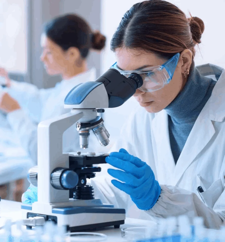 Scientific researcher analyzing natural ingredients for the Kerassentials formula